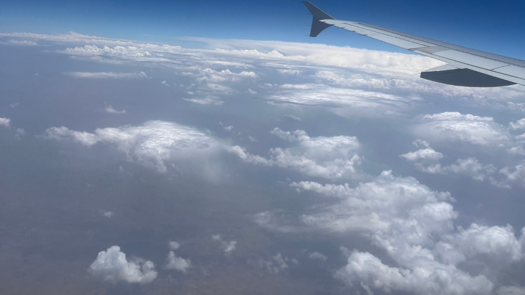 Aerial view of Delhi city seen from an airplane window during takeoff